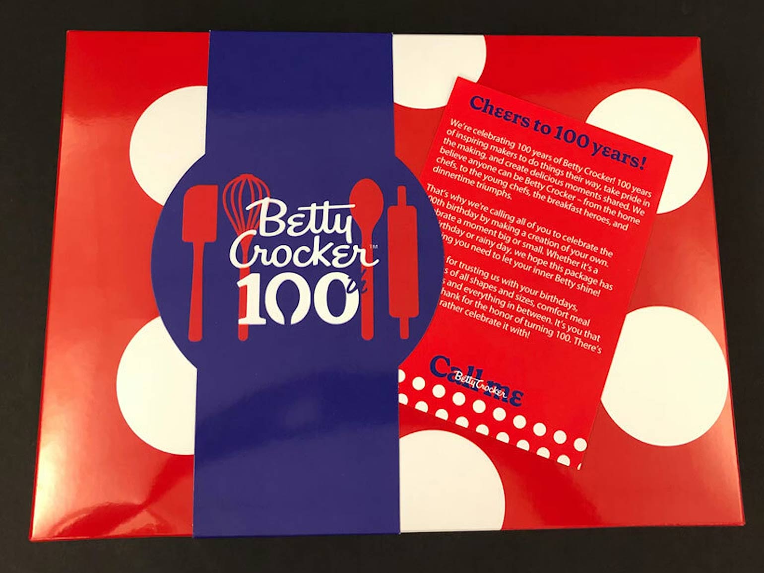 Betty Crocker 100th anniversary gift box with branded packaging, celebratory insert, and colorful custom design.