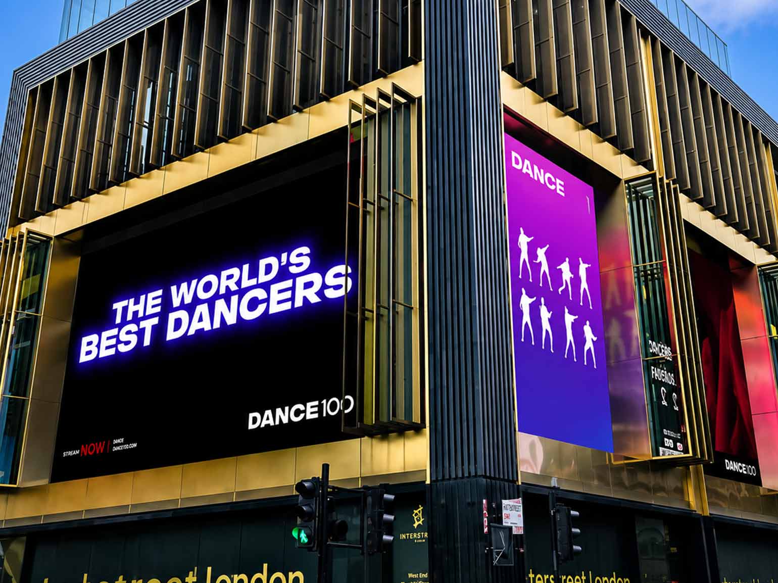 Large digital billboard promoting Netflix's Dance 100 on a modern city building with illuminated outdoor displays.